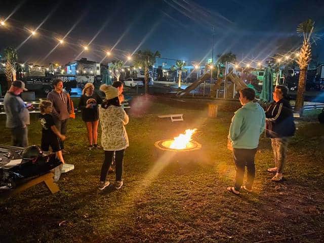 People gathered around a fire 