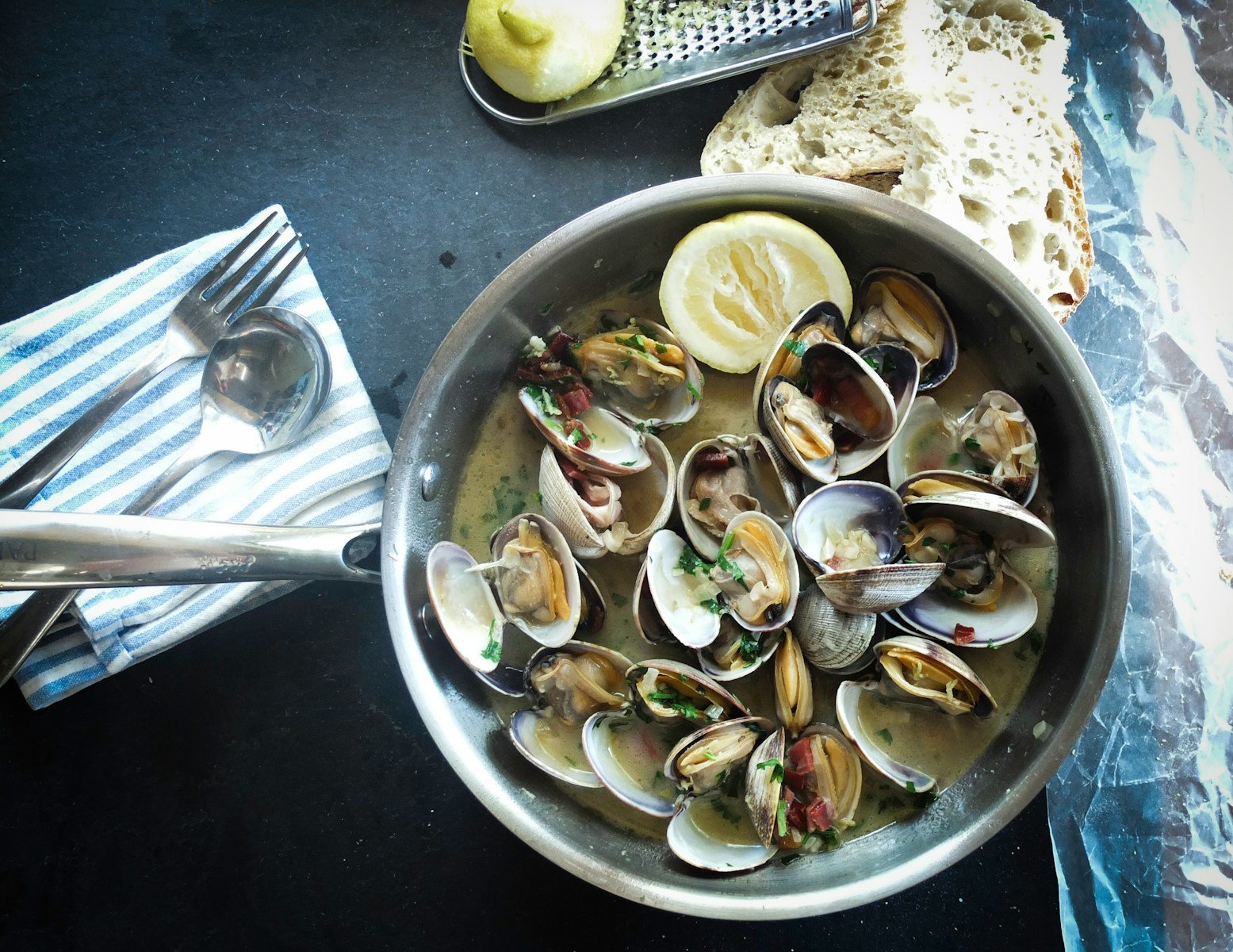round silver steel bowl with scallops where do locals eat seafood in myrtle beach