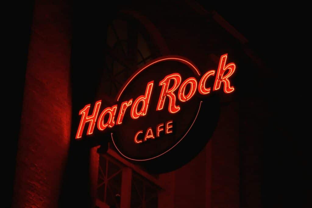 a neon sign that reads hard rock cafe