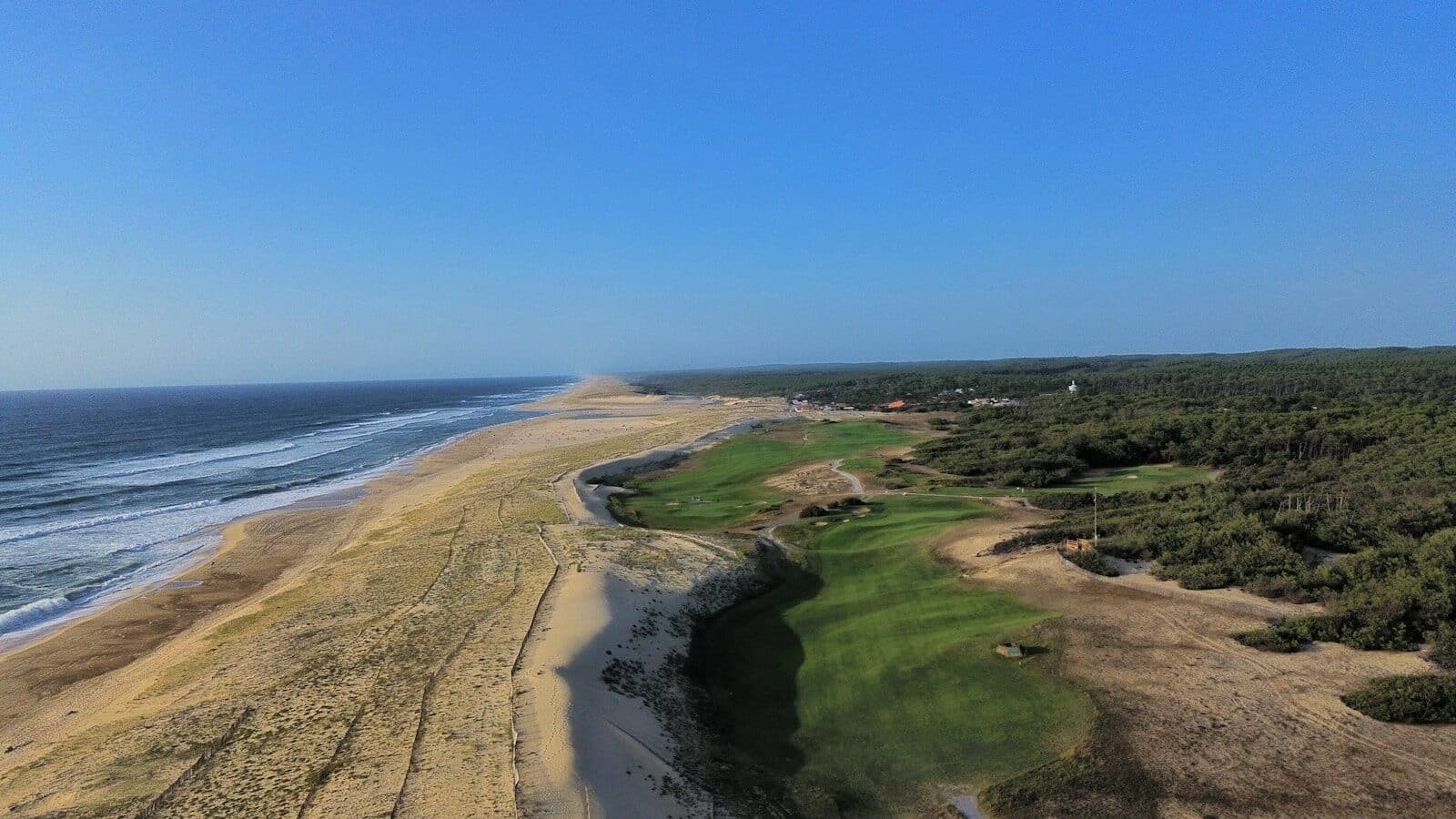 An aerial view of a sandy beach and ocean Explore the Best Myrtle Beach Golf Courses for an Unforgettable RV Trip