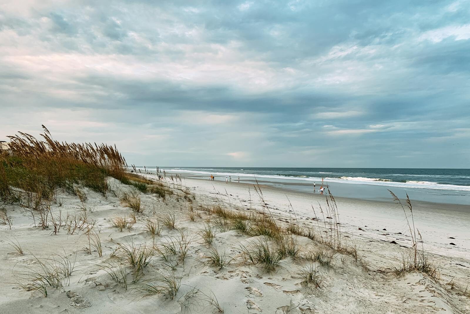 A tranquil seascape with dunes and ocean waves at Jacksonville Beach, FL.