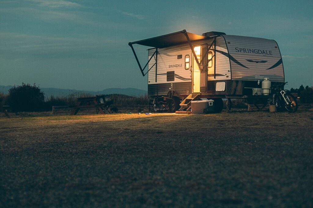 9 Quick Steps To Create a Winning Facebook Marketplace Listing for Your RV Rental 21 a small camper sits in a field at night