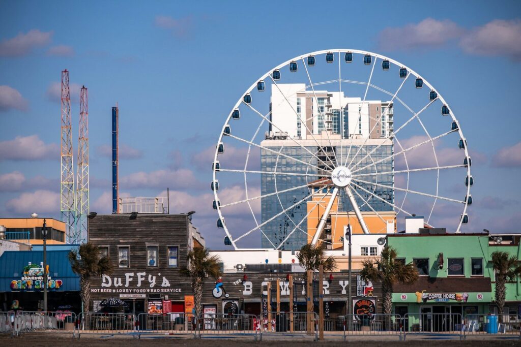 Discover This Magnificent Ferris Wheel Myrtle Beach Has To Offer | Myrtle Beach SkyWheel 11 a ferris wheel in a city